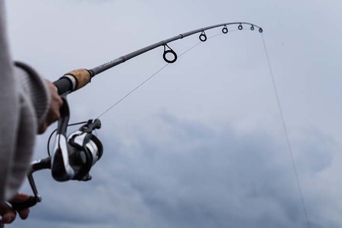 How do you string a Fishing Pole?